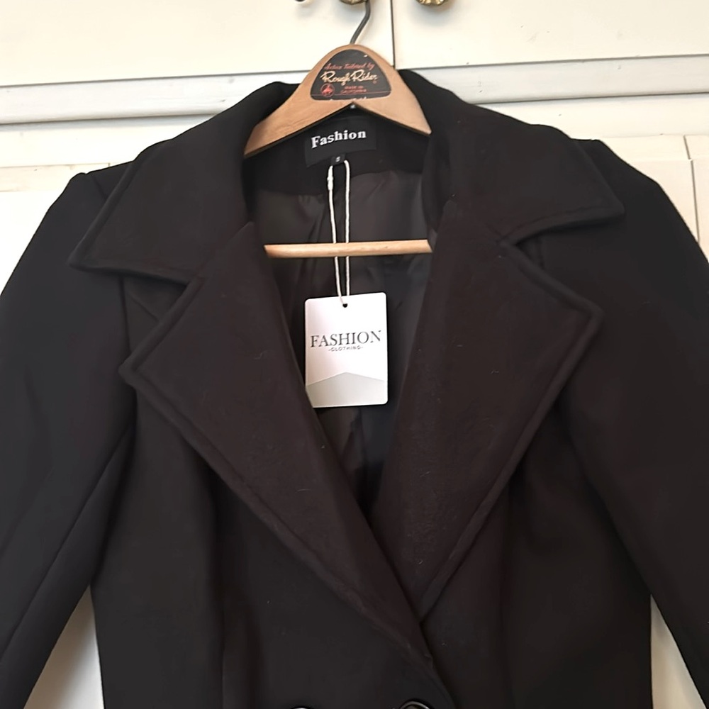 Trench Coat
Fashion Clothing 
US SIZE SMALL
Pit to Pit 19”
Length 35”
Brand New